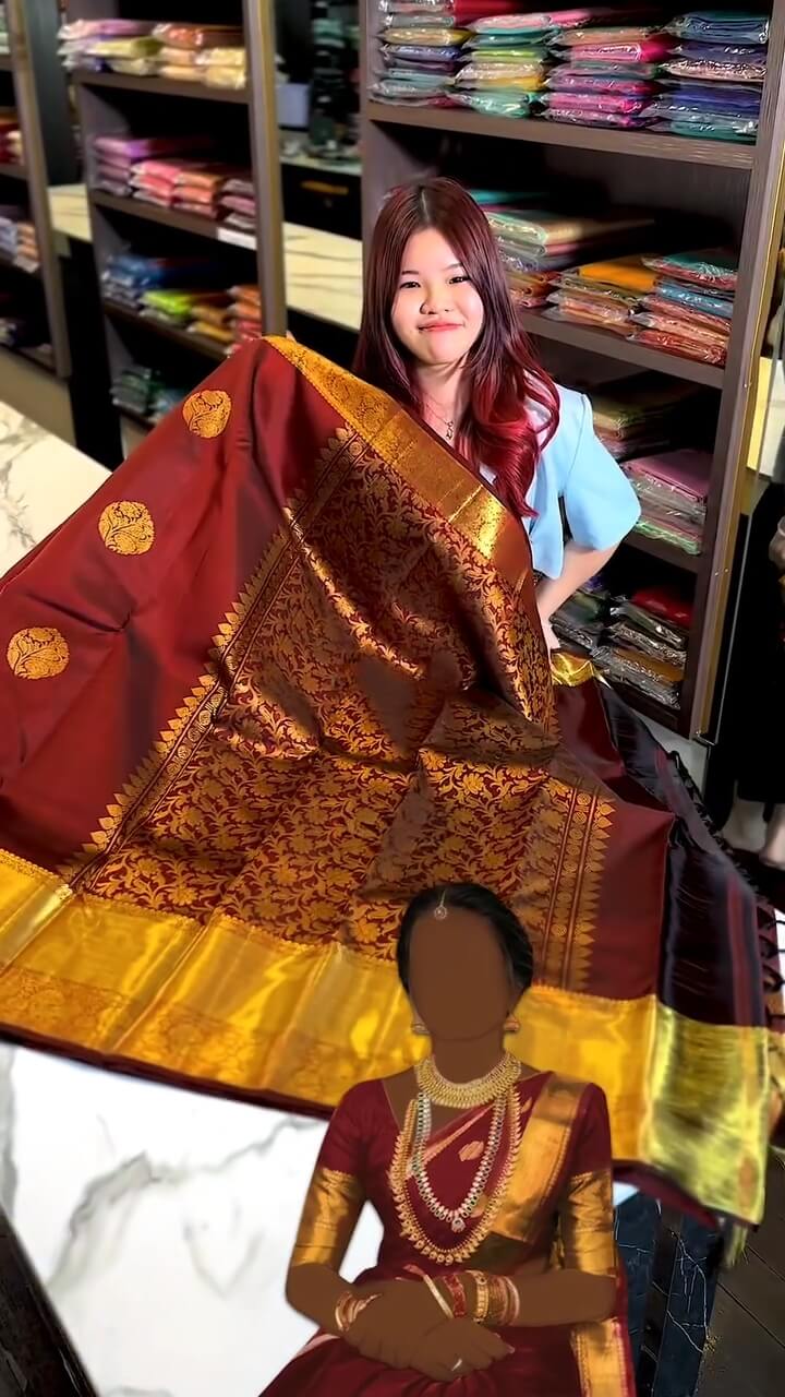 Regal Maroon and Gold Zari Woven Traditional Saree
