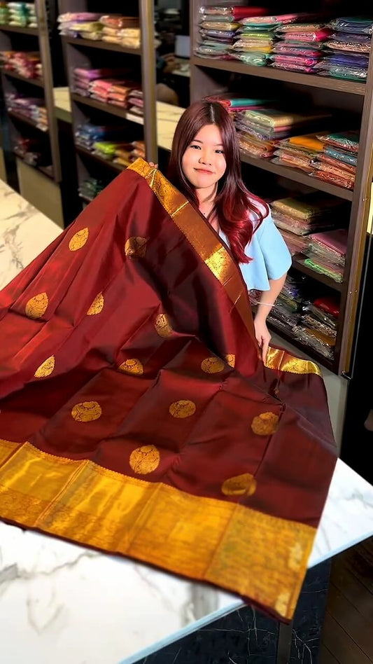 Regal Maroon and Gold Zari Woven Traditional Saree