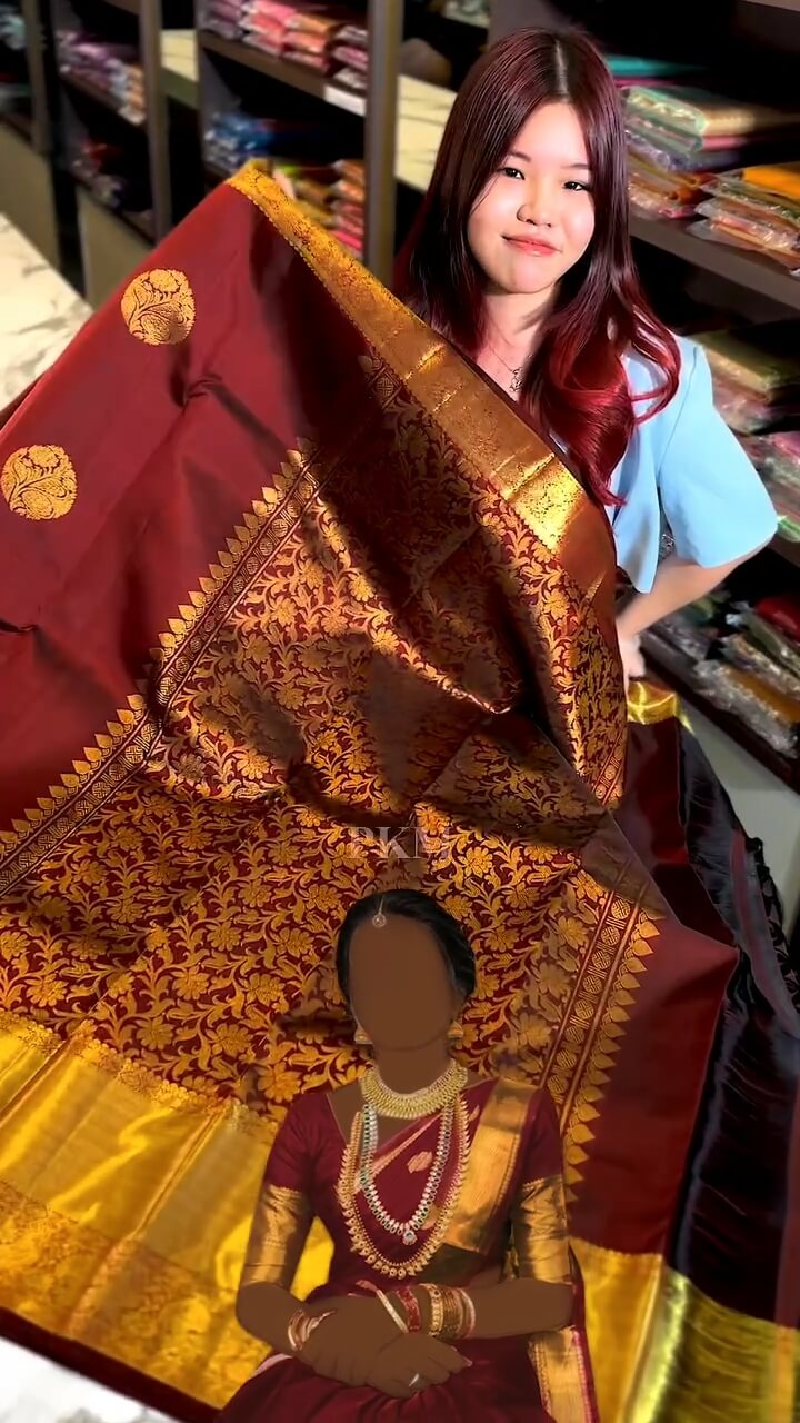Regal Maroon and Gold Zari Woven Traditional Saree