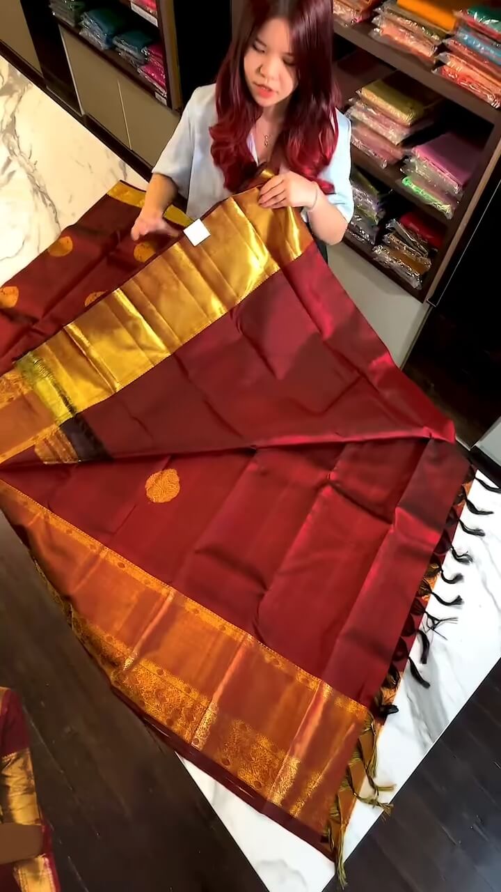 Regal Maroon and Gold Zari Woven Traditional Saree