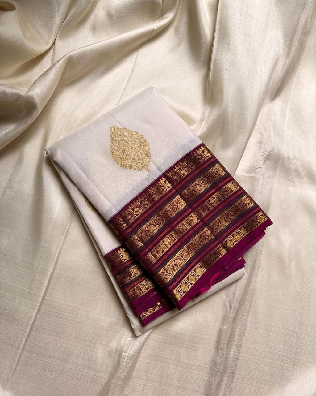 Ivory and amp Wine Purple Gold Woven Traditional Saree